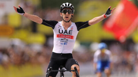 Britain’s Adam Yates beats twin brother to win first stage of Tour de France