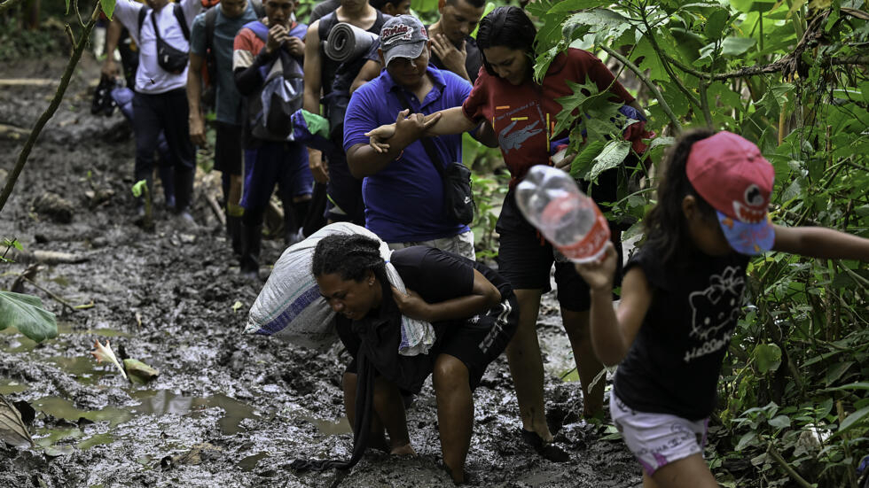 Venezuelan migrants arrive at the hamlet of Canaan Membrillo, the first border control point upon entering Panama
