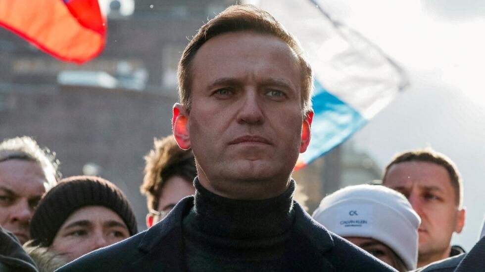 Kremlin critic Alexei Navalny takes part in a rally to mark the 5th anniversary of the assassination of opposition politician Boris Nemtsov and protest against proposed amendments to Russia's constitution in Moscow on February 29, 2020.